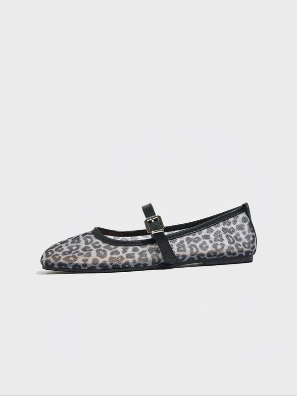 Leopard print ballet flat shoe on a white background