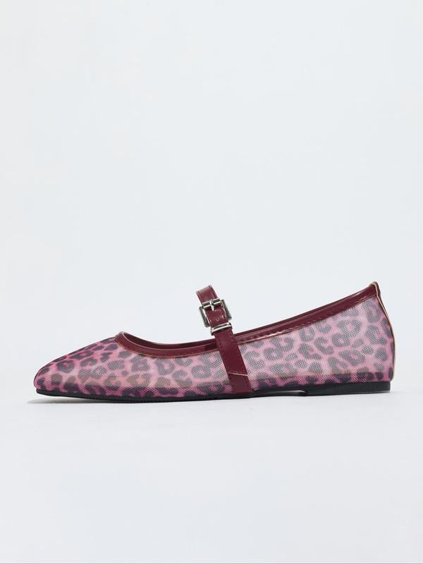 Pink leopard print flat shoe with a buckle on a light gray background