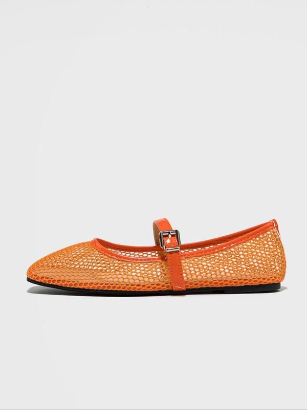 Orange mesh flat shoe with a strap on a white background